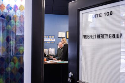 Environmental portraits for Ypsilanti Business owners, Colleen Kennedy, Jeff Muir, and Nicole Heiber, Prospect Realty on December 16, 2025.